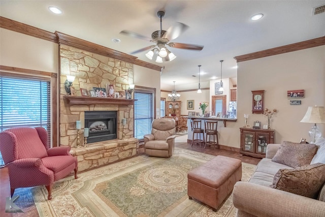 5158 Spring Creek Rd, Abilene, TX 79602 - living area with ornamental molding, a ceiling fan, a fireplace, baseboards, and wood finished floors
