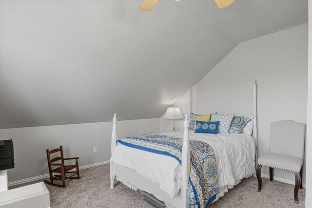 1590 N Hills Dr, Rockwall, TX 75087 - carpeted bedroom with lofted ceiling, ceiling fan, and baseboards