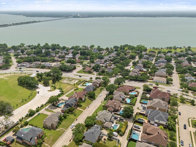 1590 N Hills Dr, Rockwall, TX 75087 - aerial overview of property's location with nearby suburban area and a large body of water