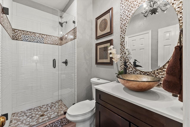 1590 N Hills Dr, Rockwall, TX 75087 - full bath with backsplash, a stall shower, toilet, and vanity