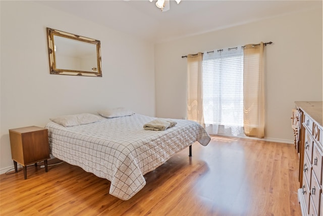 3066 Stoney Hollow Ln, Rockwall, TX 75087 - bedroom featuring light wood-style flooring and baseboards