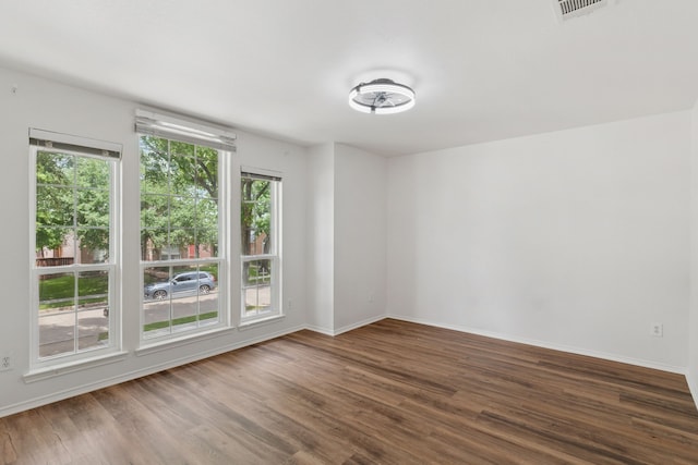 4816 Rockcreek Ln, Plano, TX 75024 - unfurnished room featuring wood finished floors and baseboards