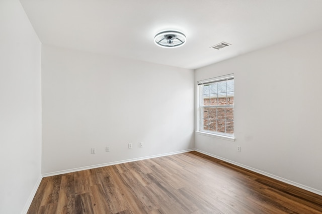4816 Rockcreek Ln, Plano, TX 75024 - unfurnished room with wood finished floors and baseboards