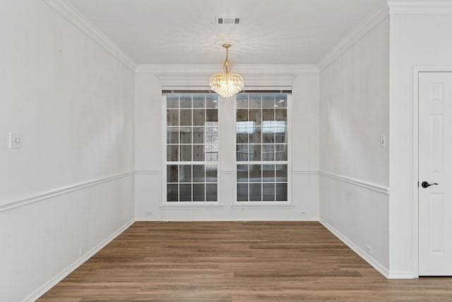 4816 Rockcreek Ln, Plano, TX 75024 - unfurnished dining area with a chandelier, wood finished floors, crown molding, and baseboards