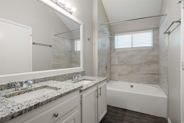 1133 Rosewood Ln, Lancaster, TX 75146 - full bathroom with tub / shower combination, wood finished floors, and double vanity