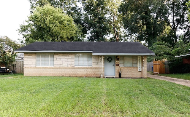view of front of house featuring brick siding