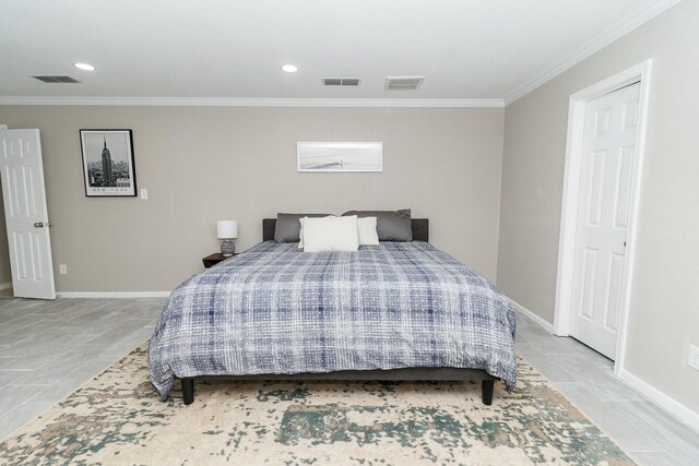 tiled bedroom featuring ornamental molding, baseboards, and recessed lighting