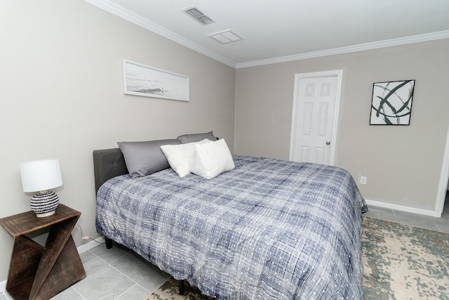 bedroom featuring tile patterned flooring, crown molding, and baseboards