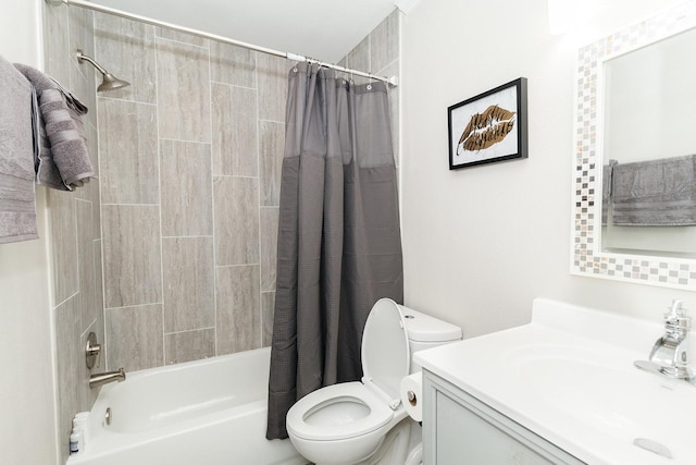 bathroom featuring shower / bath combination with curtain, toilet, and vanity