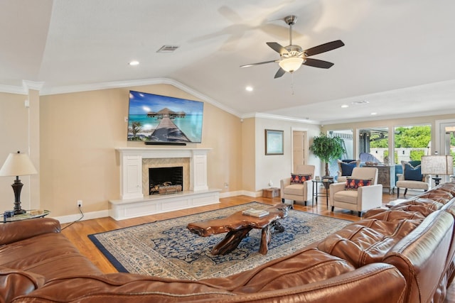 4222 Laren Ln, Dallas, TX 75244 - living area with light wood-type flooring, a ceiling fan, lofted ceiling, crown molding, and baseboards