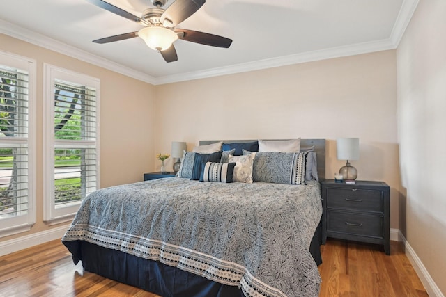 4222 Laren Ln, Dallas, TX 75244 - bedroom with baseboards, light wood-style flooring, ornamental molding, and a ceiling fan