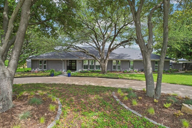 4222 Laren Ln, Dallas, TX 75244 - single story home with brick siding and a front yard