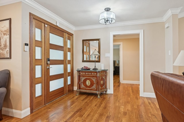 4222 Laren Ln, Dallas, TX 75244 - foyer entrance with light wood-style floors, baseboards, and crown molding