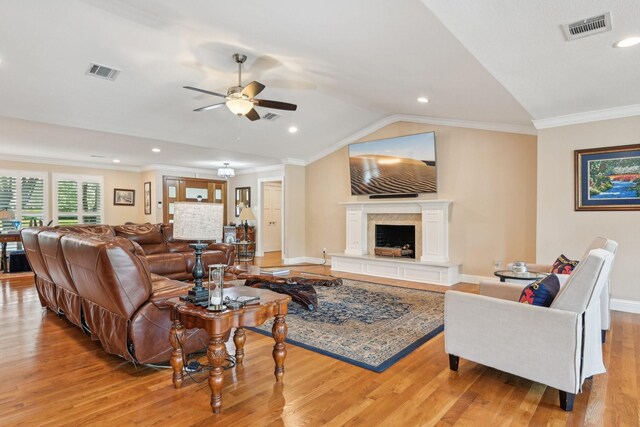 4222 Laren Ln, Dallas, TX 75244 - living room featuring ceiling fan, lofted ceiling, wood finished floors, baseboards, and a fireplace