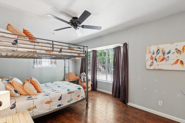 168 Barker Ln, Waco, TX 76705 - bedroom with baseboards, multiple windows, wood finished floors, and ceiling fan