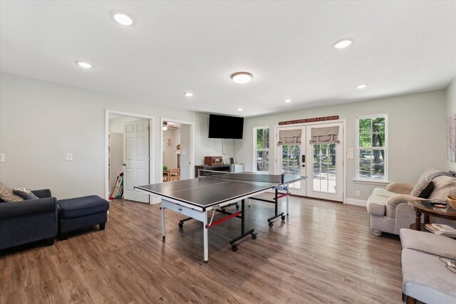 168 Barker Ln, Waco, TX 76705 - rec room featuring wood finished floors, recessed lighting, and french doors