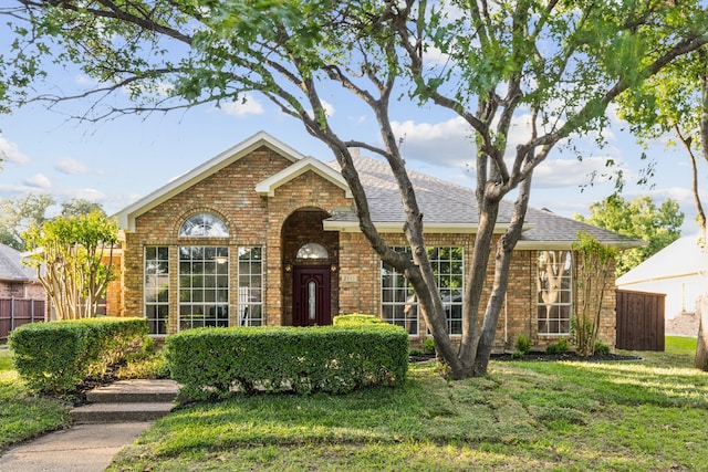 2111 Rheims Dr, Carrollton, TX 75006 - traditional home with brick siding and roof with shingles