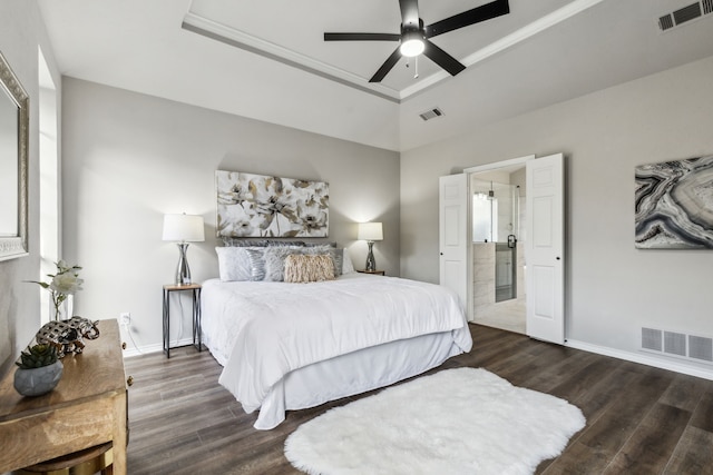 2111 Rheims Dr, Carrollton, TX 75006 - bedroom with wood finished floors, a raised ceiling, baseboards, and a ceiling fan
