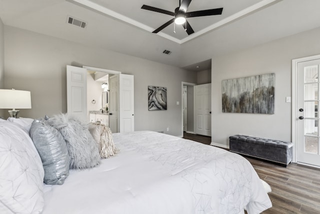 2111 Rheims Dr, Carrollton, TX 75006 - bedroom featuring dark wood-type flooring, connected bathroom, and a ceiling fan