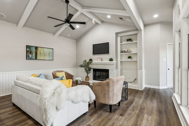 2111 Rheims Dr, Carrollton, TX 75006 - living area featuring dark wood-style flooring, ceiling fan, and a fireplace