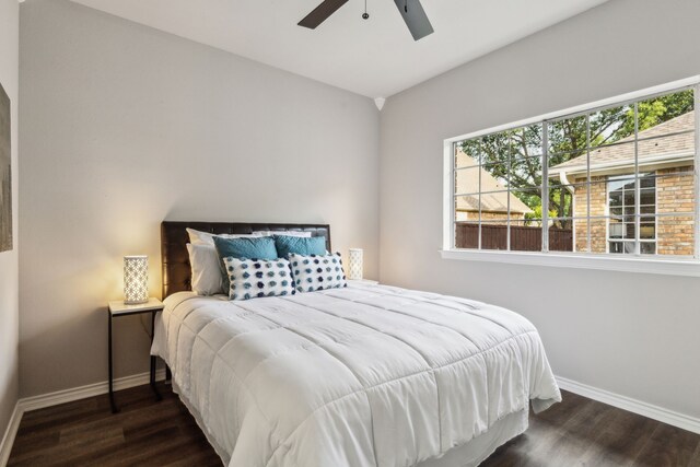 2111 Rheims Dr, Carrollton, TX 75006 - bedroom featuring baseboards, wood finished floors, and a ceiling fan