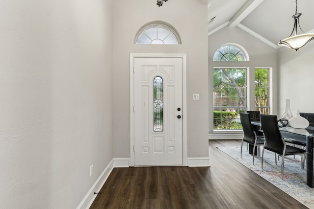 2111 Rheims Dr, Carrollton, TX 75006 - entryway with beamed ceiling, dark wood finished floors, high vaulted ceiling, and baseboards