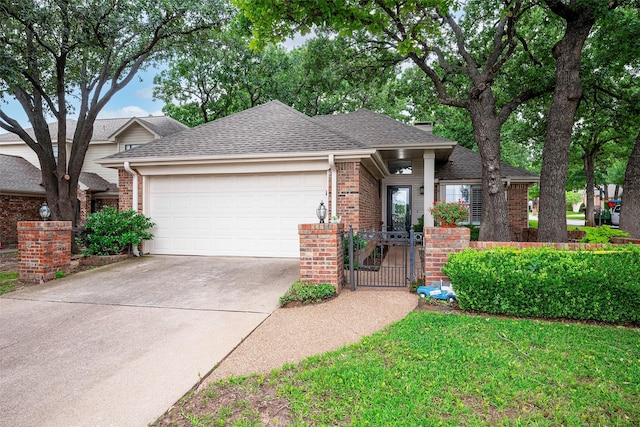 4728 Misty Oak Ln, Arlington, TX 76017 - view of front facade featuring a garage, brick siding, driveway, and a shingled roof