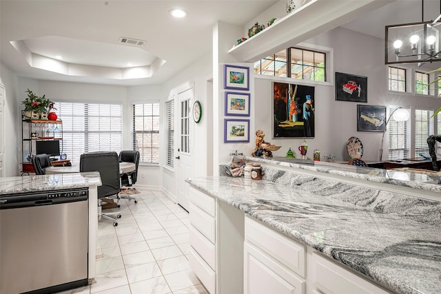 4728 Misty Oak Ln, Arlington, TX 76017 - bar area featuring dishwasher, a tray ceiling, light marble finish floors, recessed lighting, and baseboards