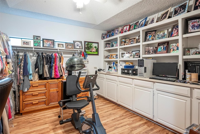 4728 Misty Oak Ln, Arlington, TX 76017 - office with a textured ceiling, light wood-style floors, and a ceiling fan