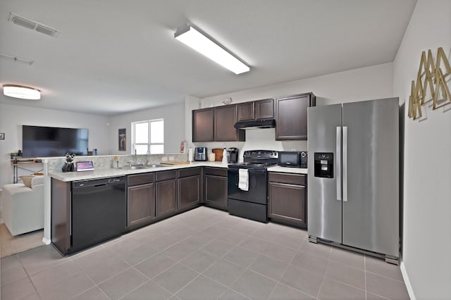 3434 Chicago St, Dallas, TX 75212 - kitchen featuring black appliances, under cabinet range hood, a sink, dark brown cabinets, and light countertops