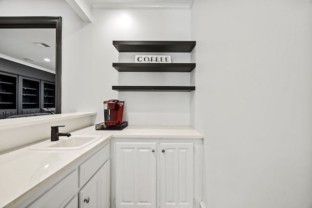 2320 Table Rock Ct, Arlington, TX 76006 - bathroom with crown molding and vanity
