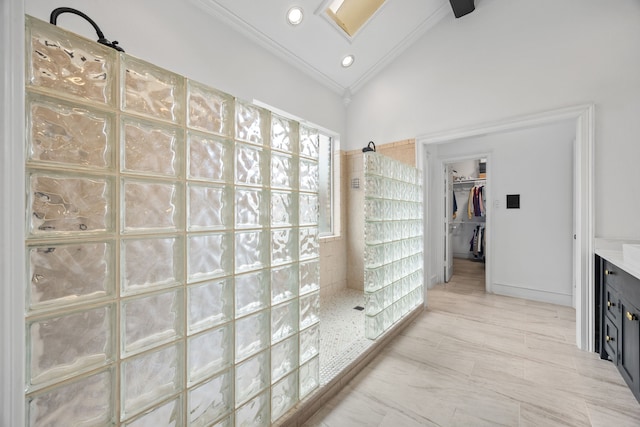 2320 Table Rock Ct, Arlington, TX 76006 - full bathroom featuring walk in shower, vaulted ceiling, ornamental molding, a spacious closet, and vanity