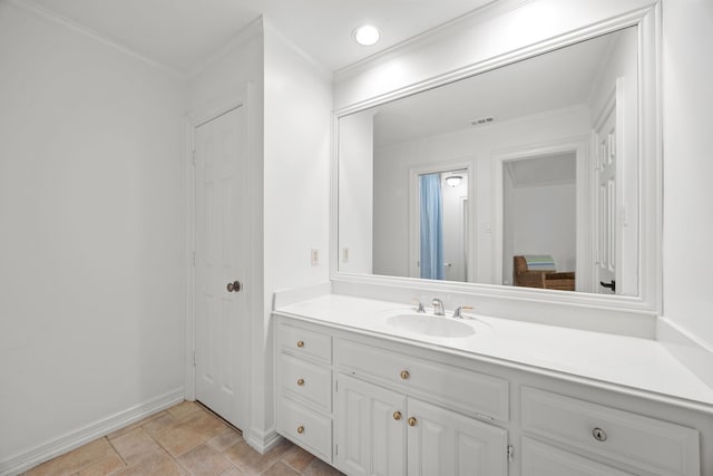 2320 Table Rock Ct, Arlington, TX 76006 - bathroom with vanity, stone finish flooring, baseboards, and ornamental molding