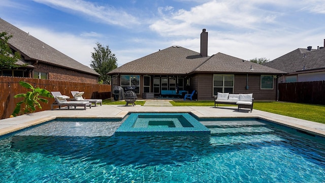 5336 Threshing Dr, Fort Worth, TX 76179 - view of pool featuring a sunroom, a patio, an outdoor hangout area, and a pool with connected hot tub