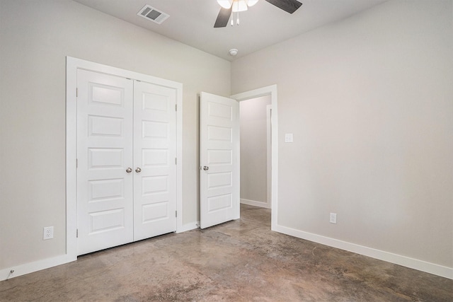 4041/2 Evans St, Cleburne, TX 76031 - unfurnished bedroom featuring concrete flooring, a closet, baseboards, and a ceiling fan