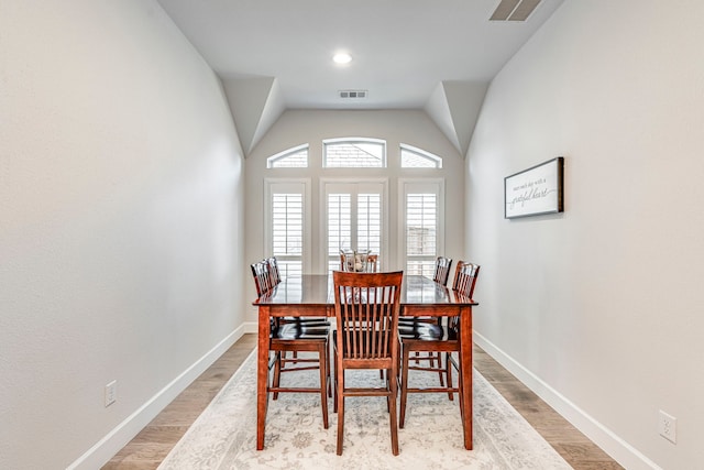 2826 Shane Dr, Midlothian, TX 76065 - dining area featuring light wood-type flooring, baseboards, and vaulted ceiling