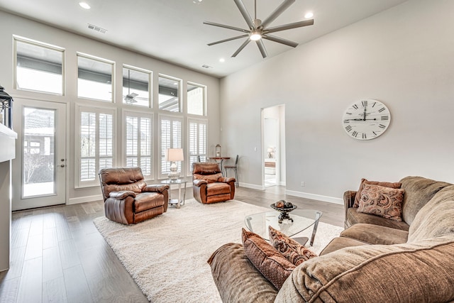 2826 Shane Dr, Midlothian, TX 76065 - living room featuring ceiling fan, healthy amount of natural light, a high ceiling, baseboards, and recessed lighting