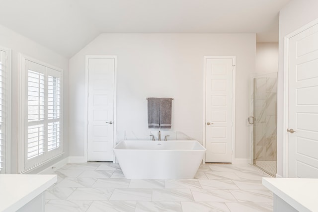 2826 Shane Dr, Midlothian, TX 76065 - full bathroom with a stall shower, a freestanding bath, marble finish flooring, vaulted ceiling, and baseboards