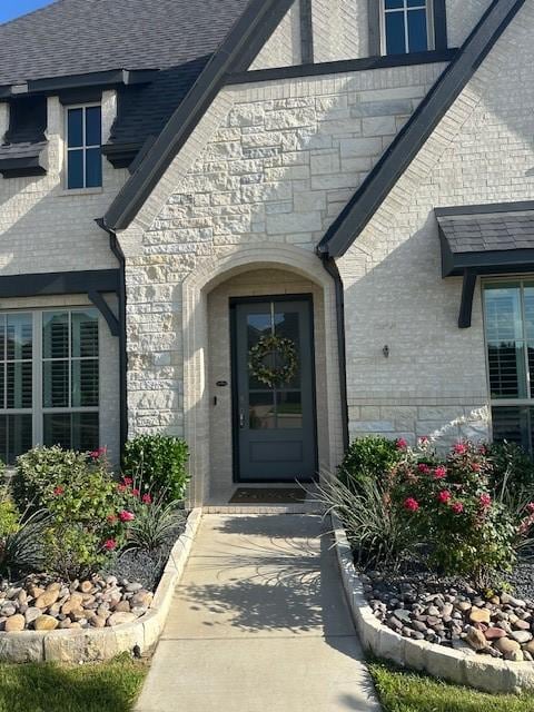 2826 Shane Dr, Midlothian, TX 76065 - entrance to property with roof with shingles, brick siding, and stone siding
