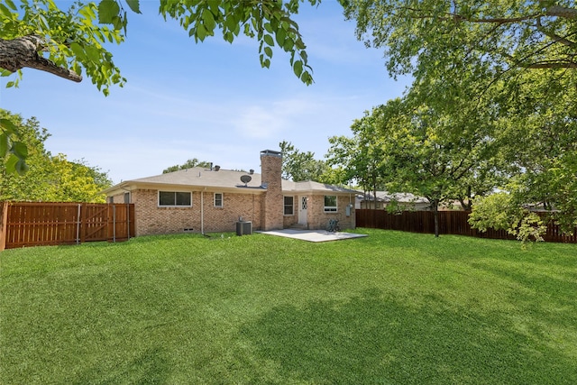 320 Allenwood Dr, Princeton, TX 75407 - rear view of property with a patio, brick siding, a chimney, and central air condition unit