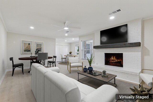 320 Allenwood Dr, Princeton, TX 75407 - living area featuring ceiling fan, a brick fireplace, light wood-style flooring, baseboards, and recessed lighting