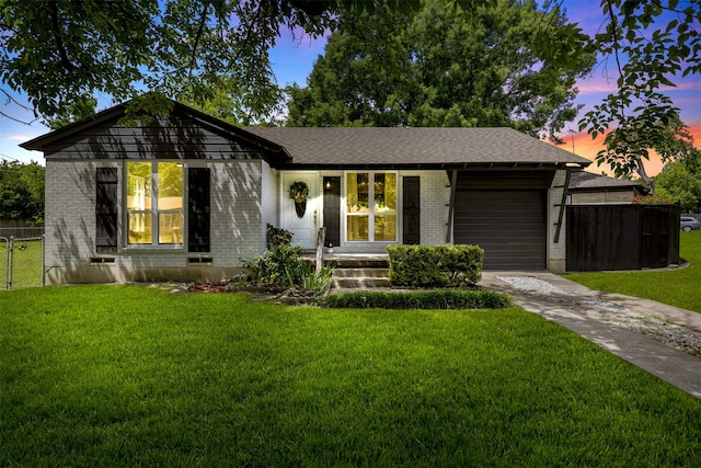 1900 Sussex Dr, Garland, TX 75041 - ranch-style home featuring brick siding, driveway, an attached garage, and a porch