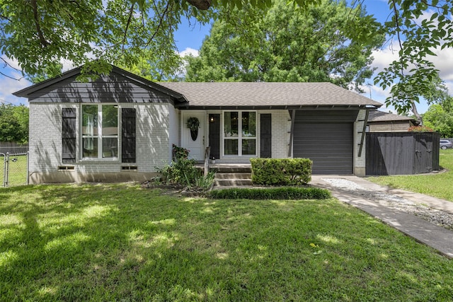 1900 Sussex Dr, Garland, TX 75041 - ranch-style house featuring brick siding, a garage, driveway, covered porch, and a shingled roof