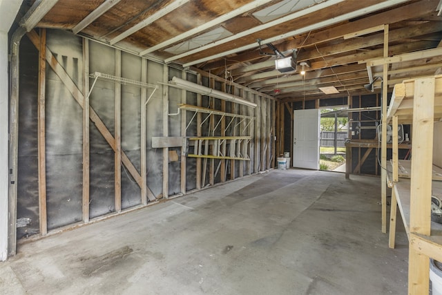 1900 Sussex Dr, Garland, TX 75041 - garage featuring a garage door opener