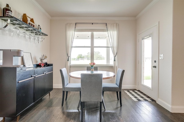 340 Sanger Dr, Springtown, TX 76082 - dining area with dark wood finished floors, crown molding, and baseboards