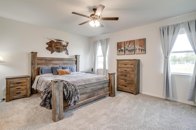 340 Sanger Dr, Springtown, TX 76082 - bedroom with carpet flooring, ceiling fan, and baseboards