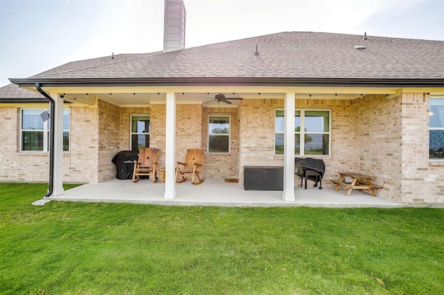340 Sanger Dr, Springtown, TX 76082 - back of house with roof with shingles, a yard, ceiling fan, and a patio area