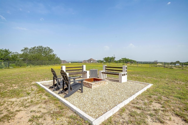 340 Sanger Dr, Springtown, TX 76082 - view of yard featuring an outdoor fire pit and a view of rural / pastoral area