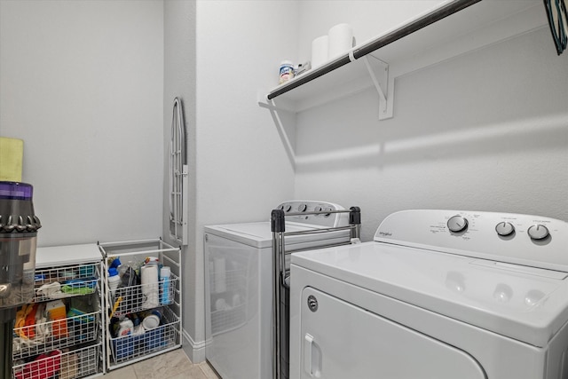 5542 Yellowstone Rd, The Colony, TX 75056 - washroom featuring separate washer and dryer and light tile patterned floors