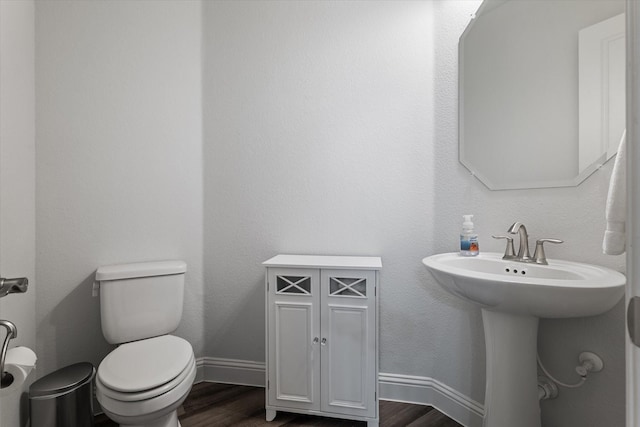 5542 Yellowstone Rd, The Colony, TX 75056 - bathroom with wood finished floors and toilet